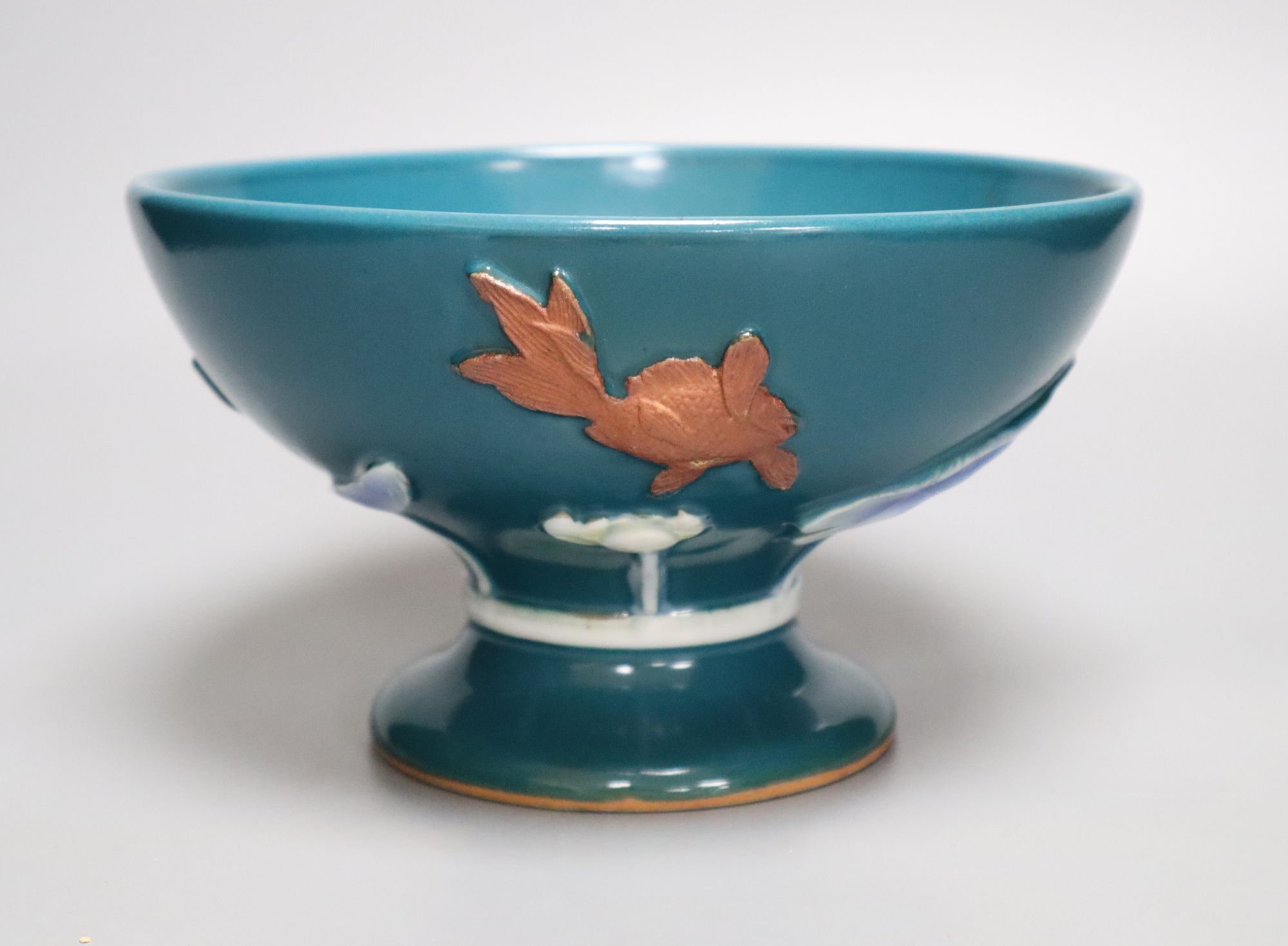 An Asian green glazed lotus pedestal bowl, diameter 22cm height 12.5cm